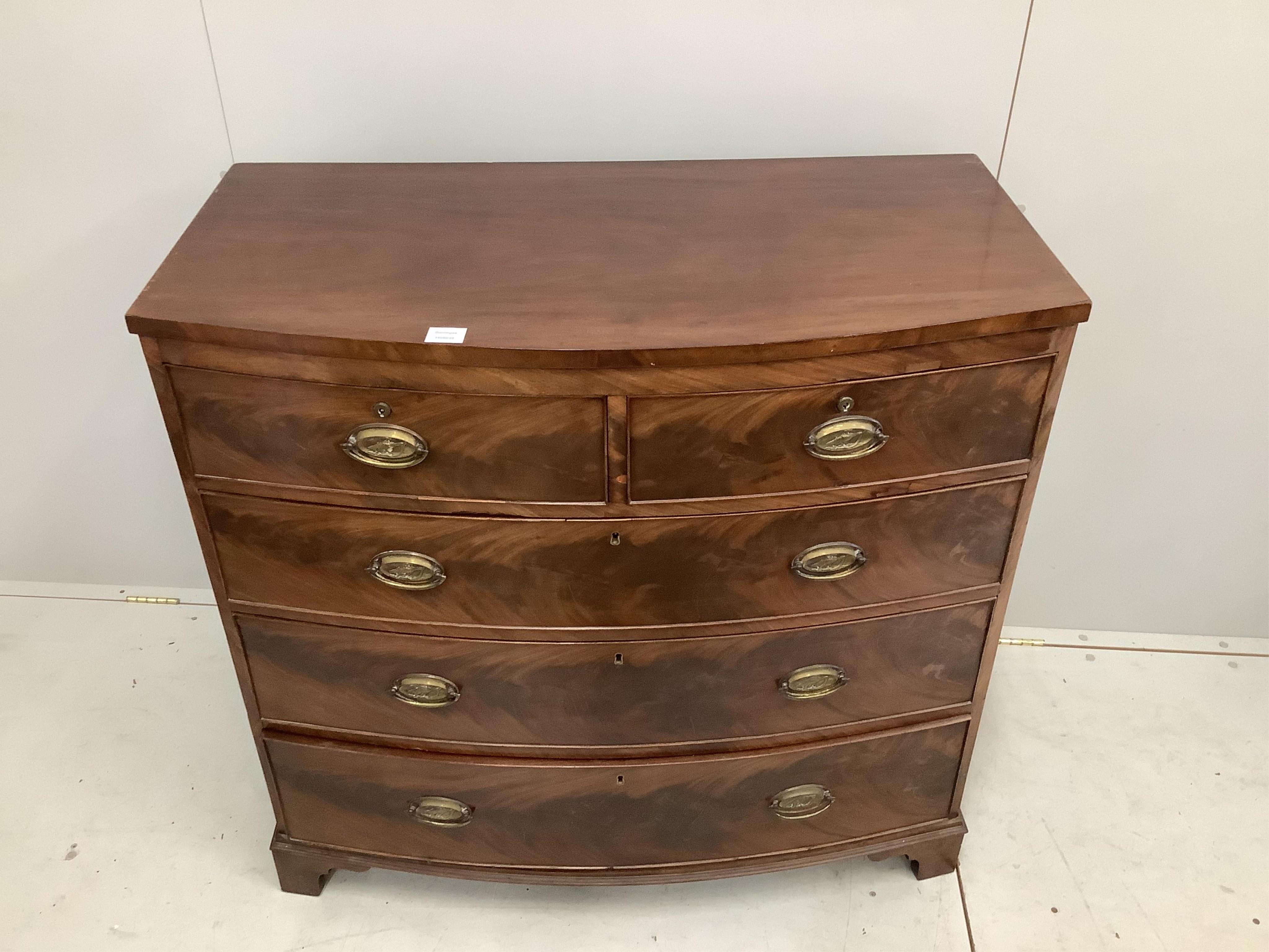 A Regency mahogany bowfronted chest of drawers, width 106cm, depth 54cm, height 101cm. Condition - fair